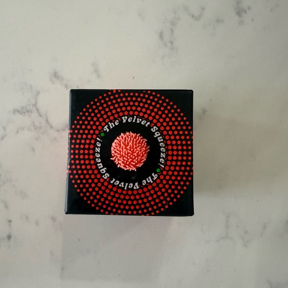 NeeDoh Fuzz Ball in bright orange - Picture 2 of 4